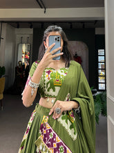 Load image into Gallery viewer, Mehendi Green Rayon Printed Silk Lehenga Choli with Gota Patti &amp; Cowrie Detailing ClothsVilla