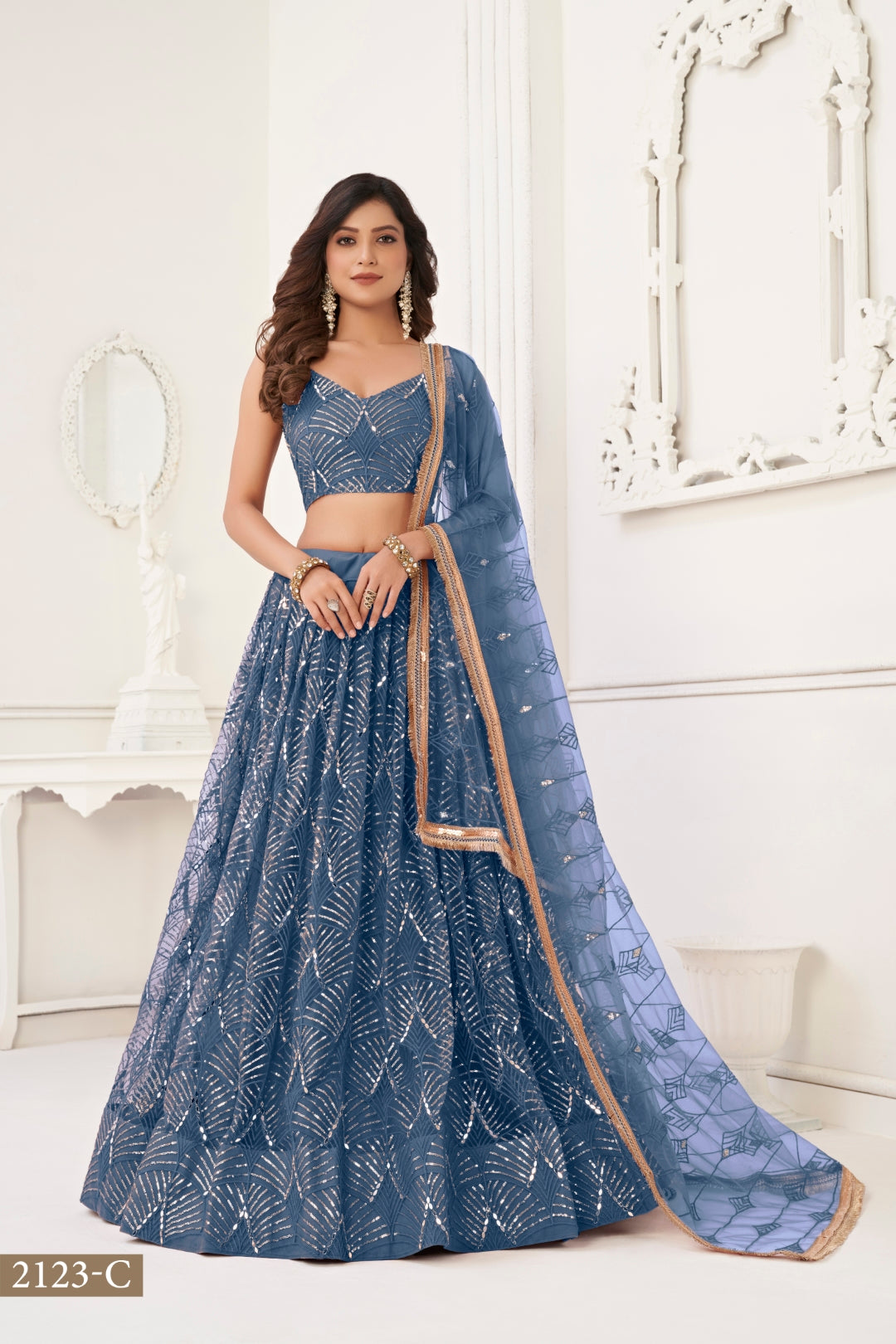 More Peach Butterfly Net Lehenga with Tone-to-Tone Thread Work and Mirror Embroidery ClothsVilla