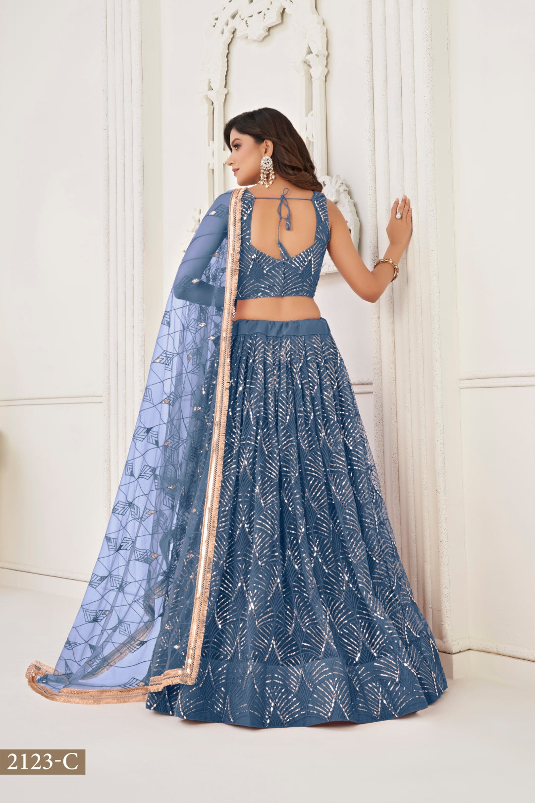 More Peach Butterfly Net Lehenga with Tone-to-Tone Thread Work and Mirror Embroidery ClothsVilla