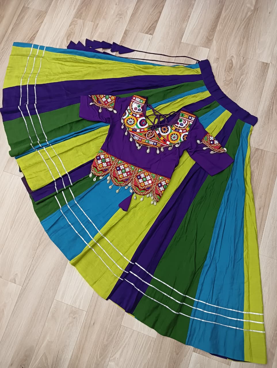 Multicolour Roman Fabric Lehenga with Gota Lace Work & Gamthi Embroidered Mirror Work Blouse ClothsVilla