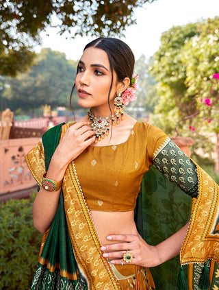 Mustard Color Mesmerize in Dola Silk Elegance Printed Lehenga Choli Set with Foil Work & Minakari ClothsVilla