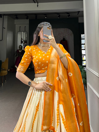 Mustard Elegant Dola Silk Shibori Print Lehenga Set with Zari Weaving Border