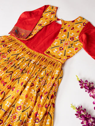Mustard Elegant Ready-to-Wear Patola Paithani Print Gown – Dola Silk with Foil Work