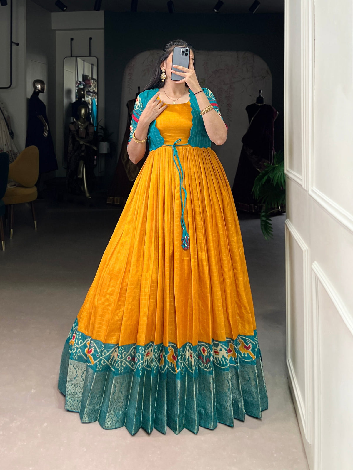 Mustard Patola Print Tasar Chex Gown with Matching Koti – Stitched Ethnic Wear Set with Weaving Border & Micro Cotton Lining ClothsVilla