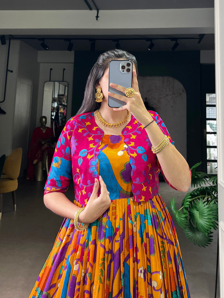 Mustard Tasar Silk Kalamkari Print Stitched Gown with Zari Weaving Koti – Full Flair Party Wear Gown Set for Women ClothsVilla