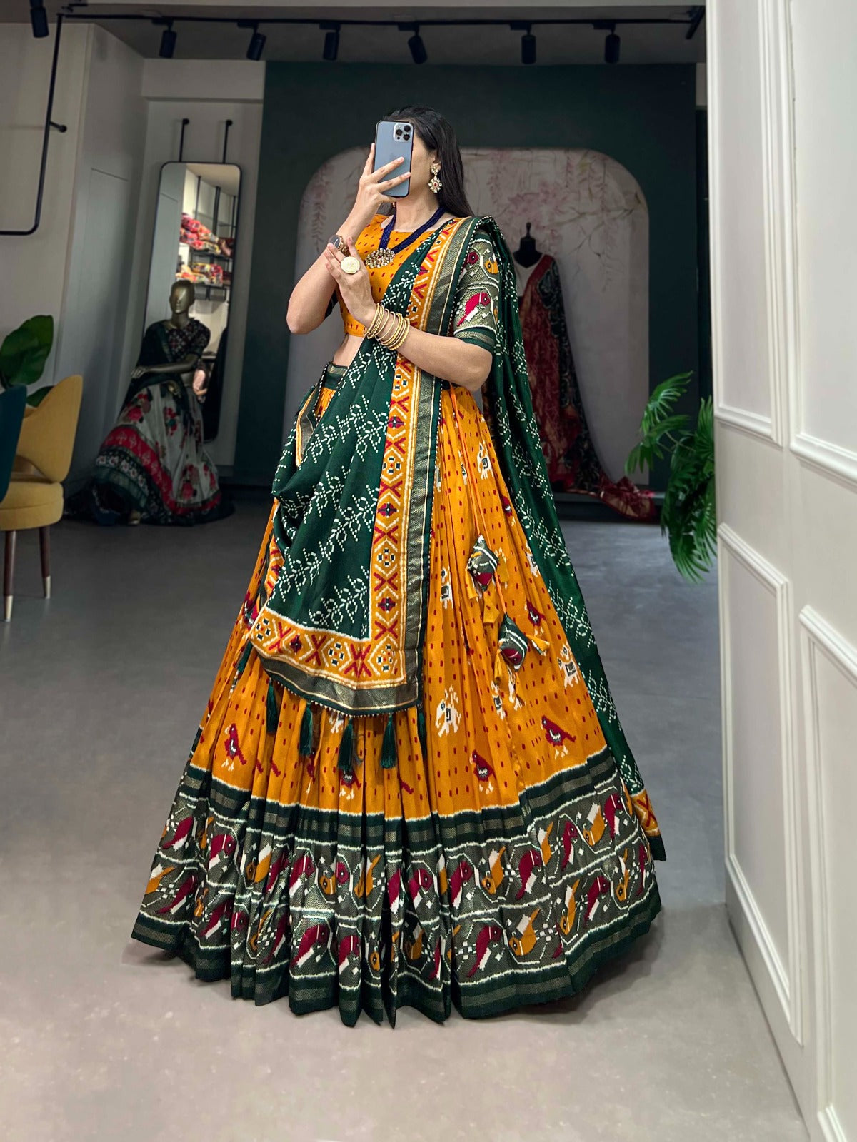 Mustard Tussar Silk Lehenga Choli with Enchanting Ikat Patola Print and Foil Work ClothsVilla