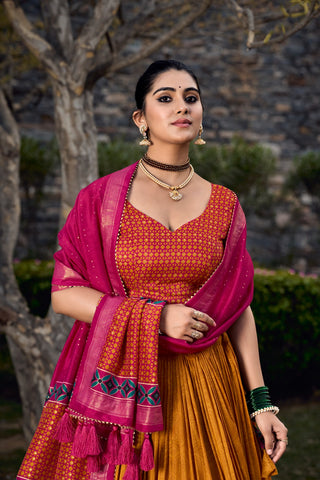 Mustard Tussar Silk Lehenga Choli with Exquisite Foil Print Florals ClothsVilla