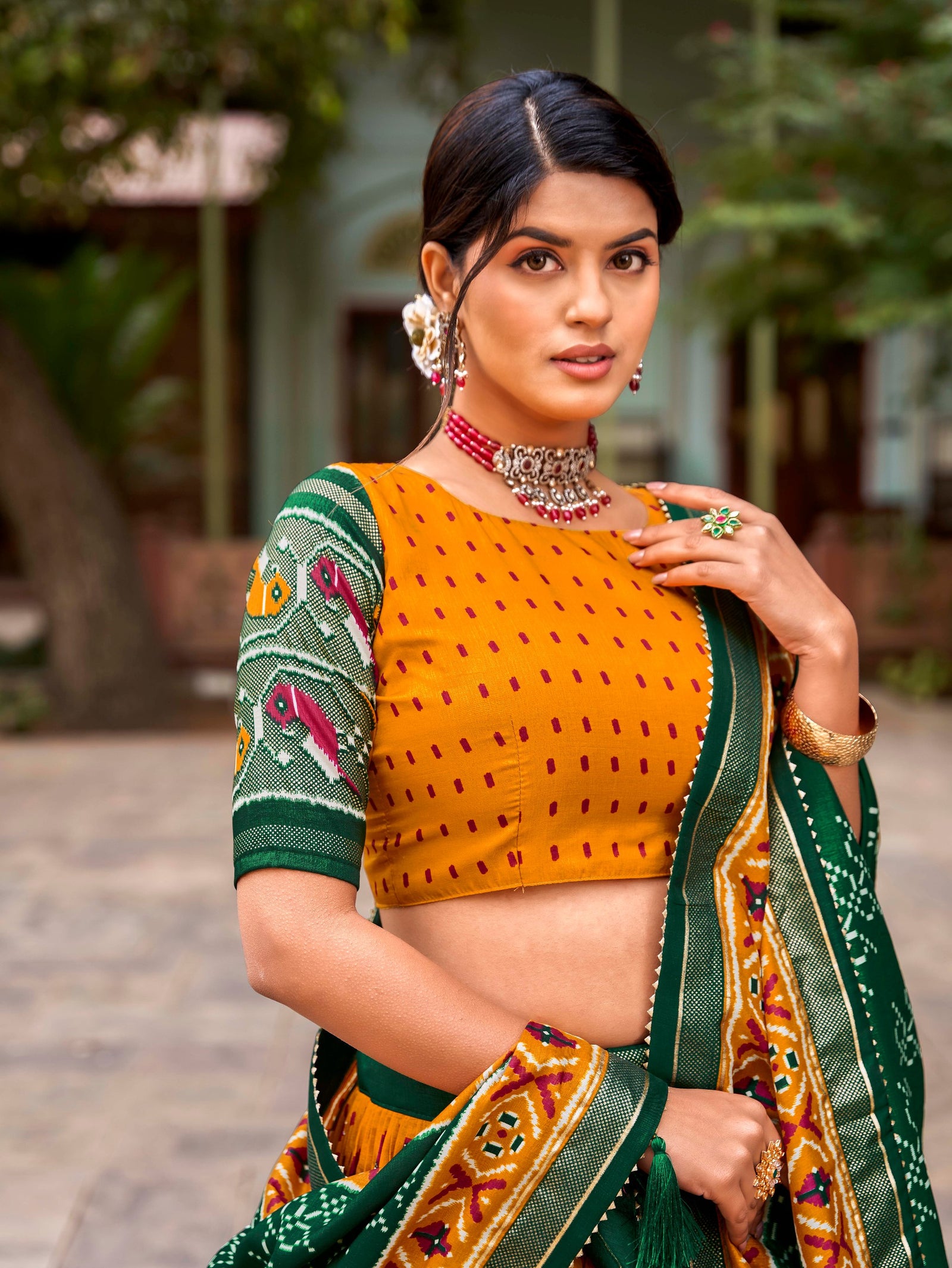 Mustard Tussar Silk Lehenga Choli with Enchanting Ikat Patola Print and Foil Work ClothsVilla
