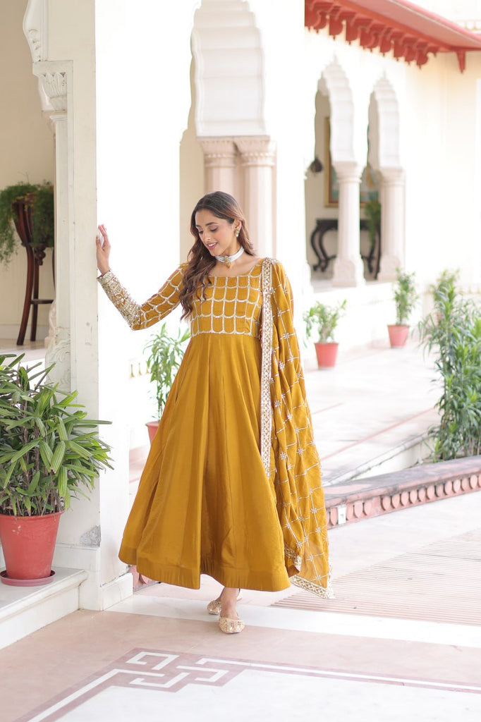 Mustard Vichitra Sequins & Zari Embroidered Gown with 4.2-Meter Flair & Matching Embroidered Dupatta – Full-Sleeve Designer Anarkali Gown Set ClothsVilla
