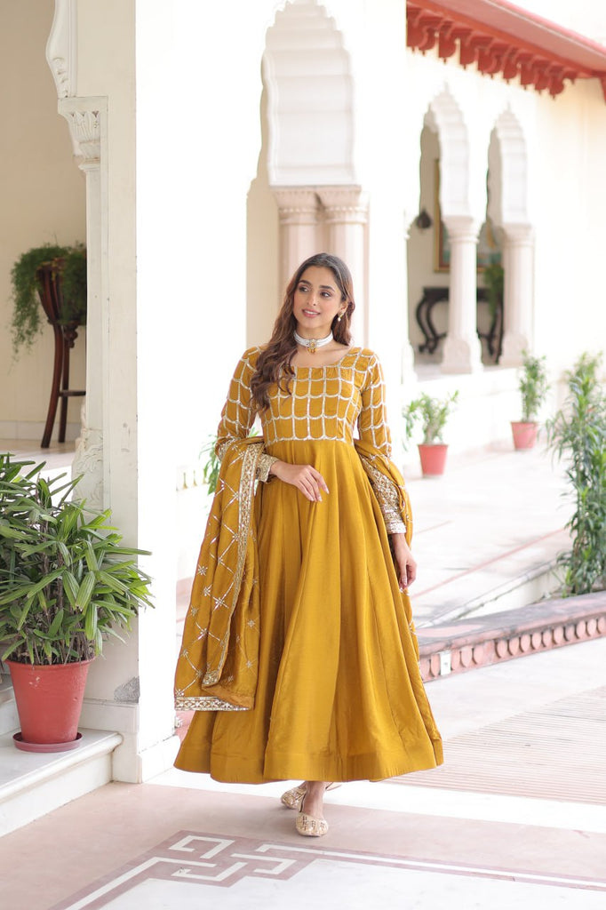 Mustard Vichitra Sequins & Zari Embroidered Gown with 4.2-Meter Flair & Matching Embroidered Dupatta – Full-Sleeve Designer Anarkali Gown Set ClothsVilla
