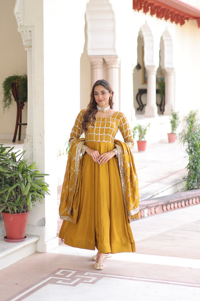 Mustard Vichitra Sequins & Zari Embroidered Gown with 4.2-Meter Flair & Matching Embroidered Dupatta – Full-Sleeve Designer Anarkali Gown Set ClothsVilla