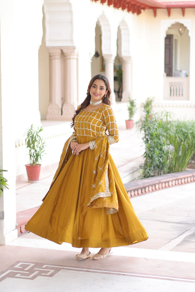 Mustard Vichitra Sequins & Zari Embroidered Gown with 4.2-Meter Flair & Matching Embroidered Dupatta – Full-Sleeve Designer Anarkali Gown Set ClothsVilla