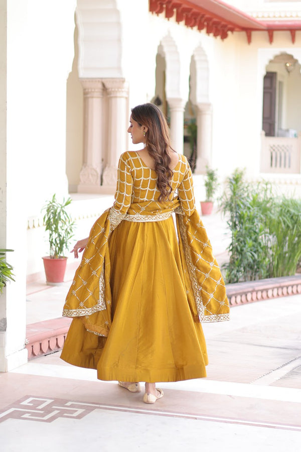 Mustard Vichitra Sequins & Zari Embroidered Gown with 4.2-Meter Flair & Matching Embroidered Dupatta – Full-Sleeve Designer Anarkali Gown Set ClothsVilla