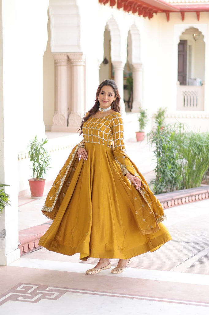 Mustard Vichitra Sequins & Zari Embroidered Gown with 4.2-Meter Flair & Matching Embroidered Dupatta – Full-Sleeve Designer Anarkali Gown Set ClothsVilla
