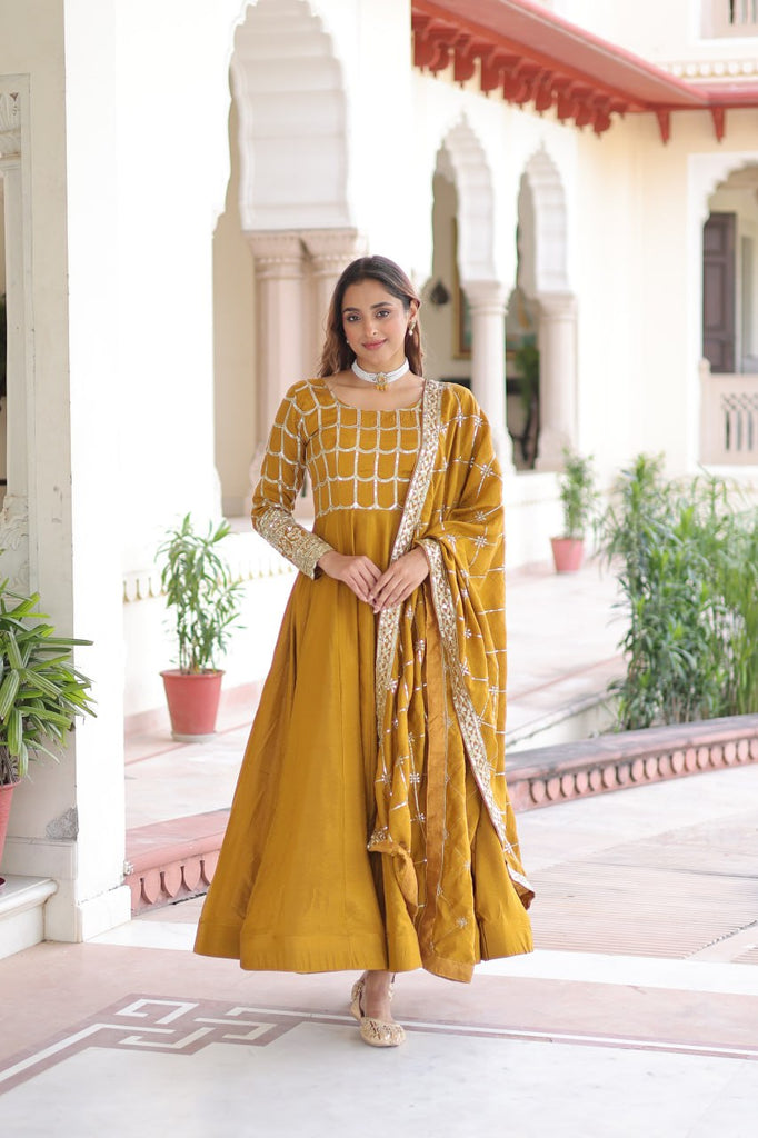 Mustard Vichitra Sequins & Zari Embroidered Gown with 4.2-Meter Flair & Matching Embroidered Dupatta – Full-Sleeve Designer Anarkali Gown Set ClothsVilla