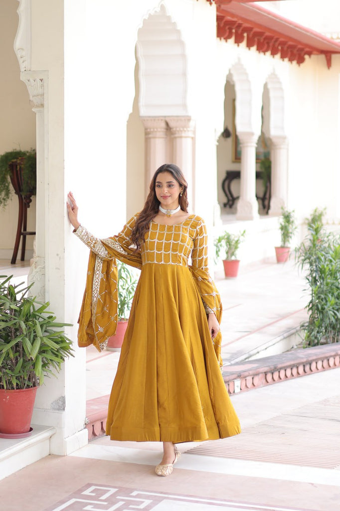 Mustard Vichitra Sequins & Zari Embroidered Gown with 4.2-Meter Flair & Matching Embroidered Dupatta – Full-Sleeve Designer Anarkali Gown Set ClothsVilla