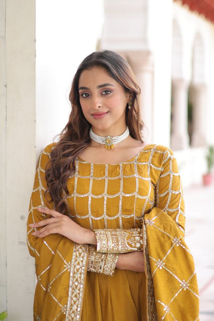 Mustard Vichitra Sequins & Zari Embroidered Gown with 4.2-Meter Flair & Matching Embroidered Dupatta – Full-Sleeve Designer Anarkali Gown Set ClothsVilla