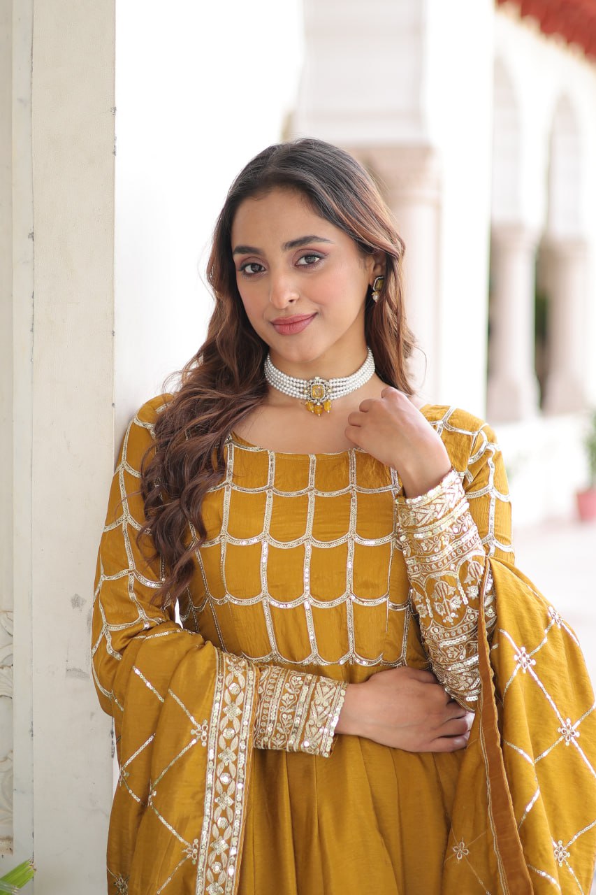 Mustard Vichitra Sequins & Zari Embroidered Gown with 4.2-Meter Flair & Matching Embroidered Dupatta – Full-Sleeve Designer Anarkali Gown Set ClothsVilla