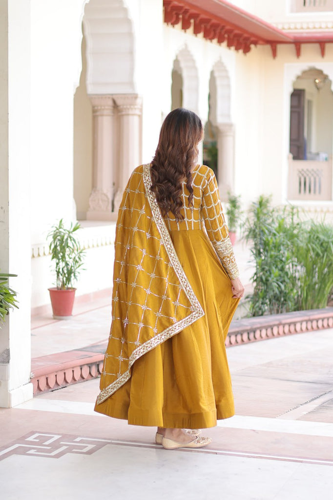 Mustard Vichitra Sequins & Zari Embroidered Gown with 4.2-Meter Flair & Matching Embroidered Dupatta – Full-Sleeve Designer Anarkali Gown Set ClothsVilla