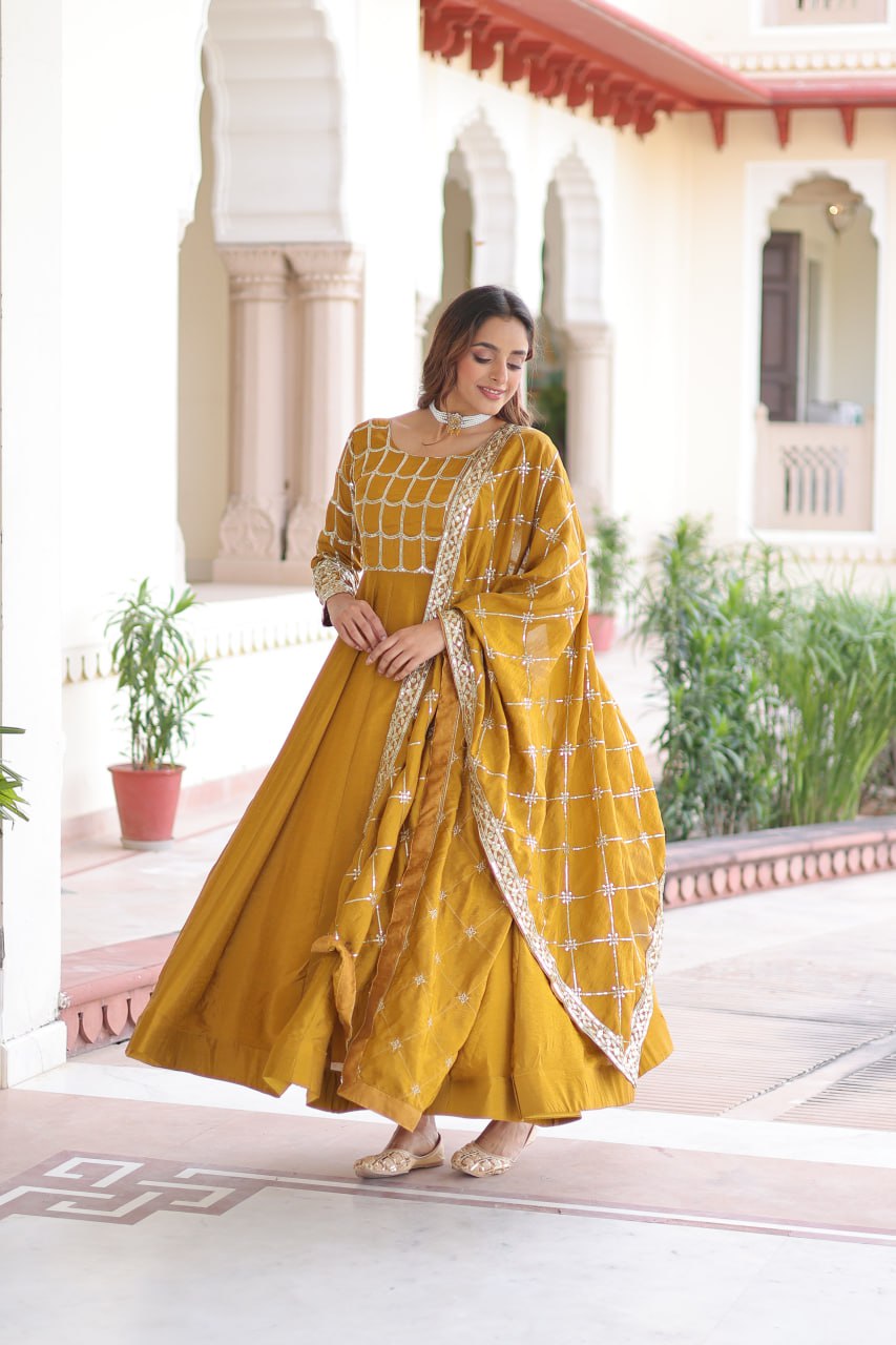 Mustard Vichitra Sequins & Zari Embroidered Gown with 4.2-Meter Flair & Matching Embroidered Dupatta – Full-Sleeve Designer Anarkali Gown Set ClothsVilla