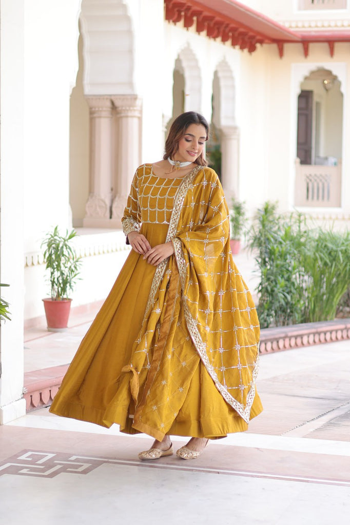 Mustard Vichitra Sequins & Zari Embroidered Gown with 4.2-Meter Flair & Matching Embroidered Dupatta – Full-Sleeve Designer Anarkali Gown Set ClothsVilla