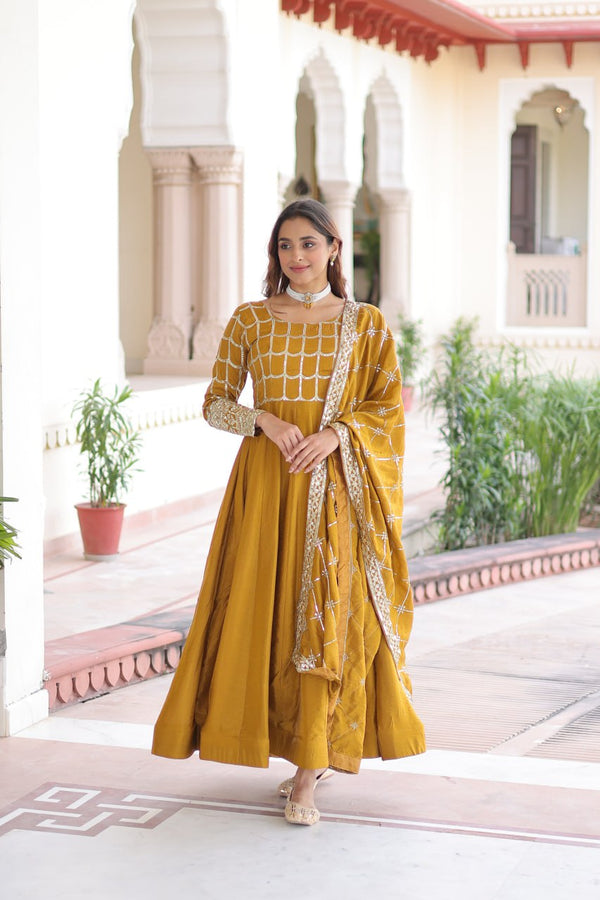 Mustard Vichitra Sequins & Zari Embroidered Gown with 4.2-Meter Flair & Matching Embroidered Dupatta – Full-Sleeve Designer Anarkali Gown Set ClothsVilla