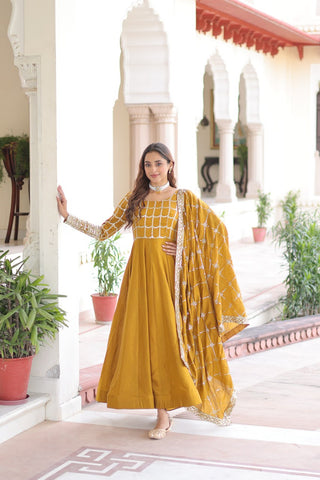 Mustard Vichitra Sequins & Zari Embroidered Gown with 4.2-Meter Flair & Matching Embroidered Dupatta – Full-Sleeve Designer Anarkali Gown Set ClothsVilla