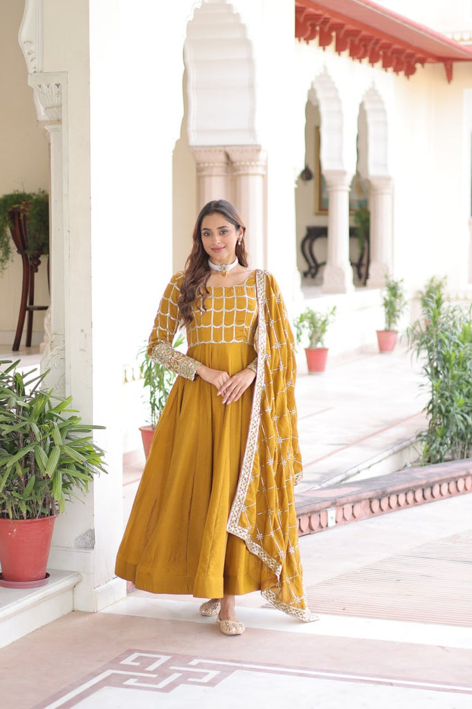 Mustard Vichitra Sequins & Zari Embroidered Gown with 4.2-Meter Flair & Matching Embroidered Dupatta – Full-Sleeve Designer Anarkali Gown Set ClothsVilla