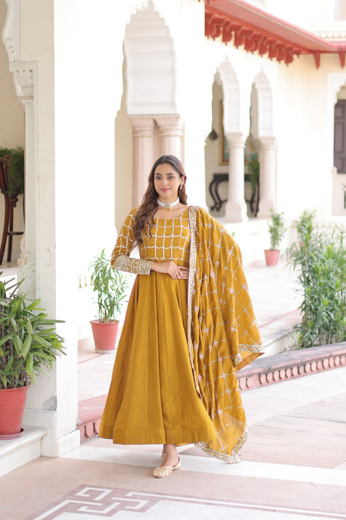 Mustard Vichitra Sequins & Zari Embroidered Gown with 4.2-Meter Flair & Matching Embroidered Dupatta – Full-Sleeve Designer Anarkali Gown Set ClothsVilla