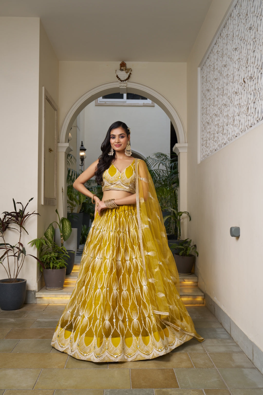 Mustard Yellow Elegant Butterfly Net Lehenga with Intricate Embroidery Main image