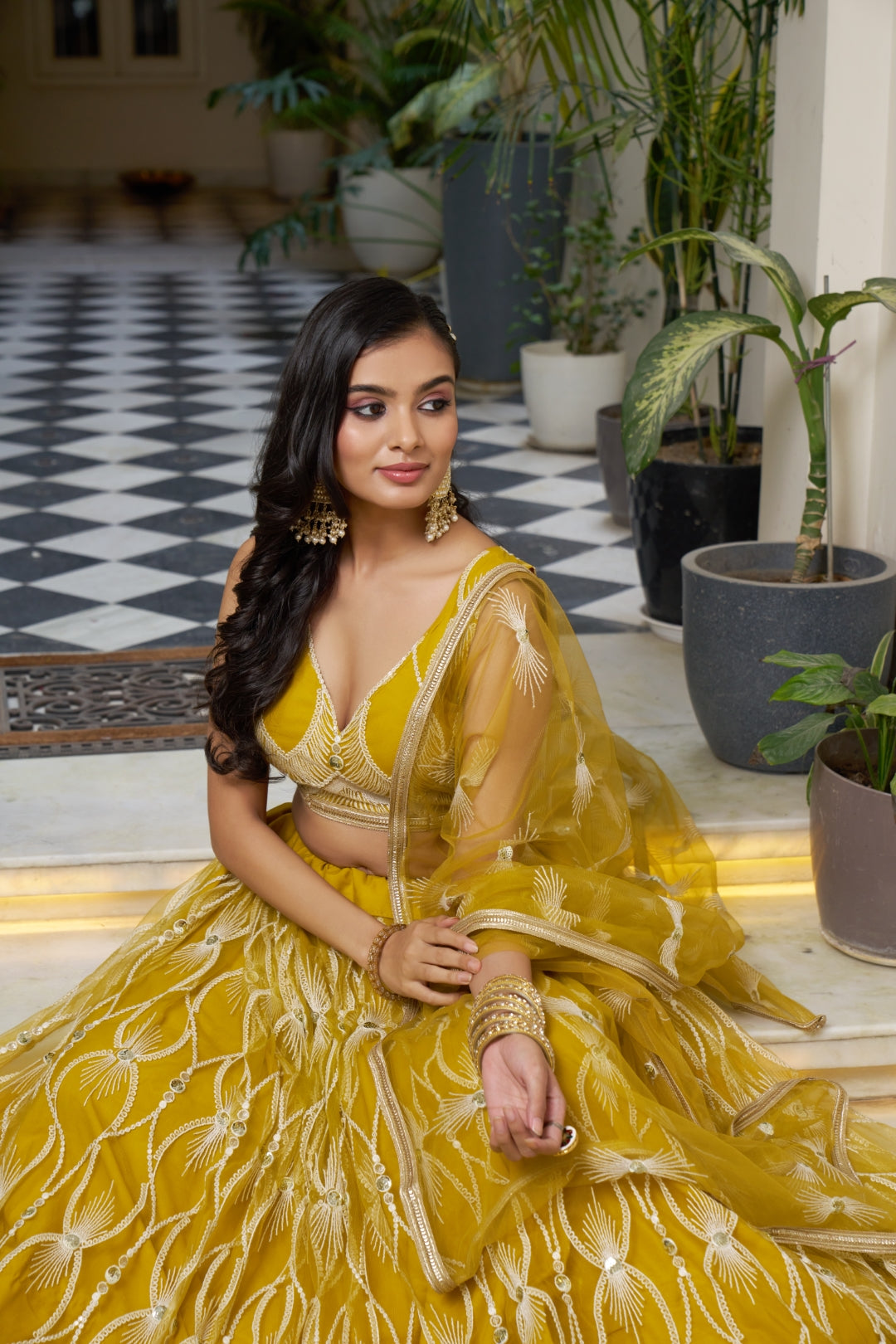 Mustard Yellow Elegant Butterfly Net Lehenga with Intricate Embroidery