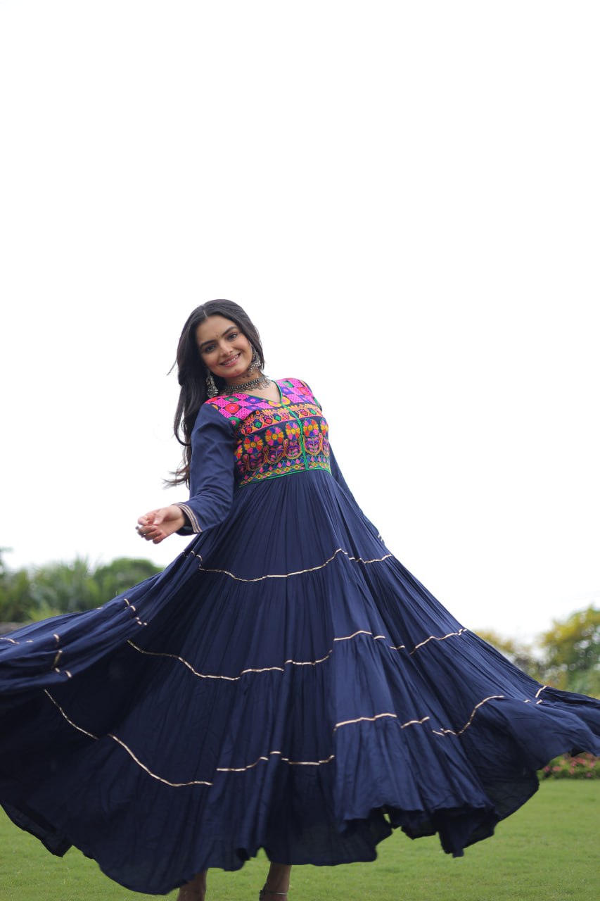 Navy Blue Navratri Special 14 Kg Reyon Gown with Kutchi Gamthi & Mirror Hand Work – 4-Layer Frill, 10+ Meter Flair ClothsVilla