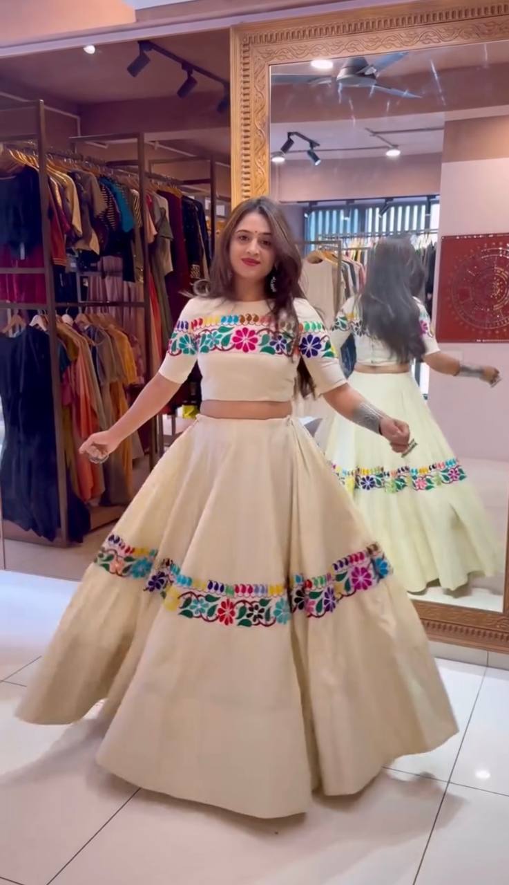 Off White Exquisite Pure Kora Cotton Navratri Lehenga Choli with Gamthi & Mirror Handwork ClothsVilla