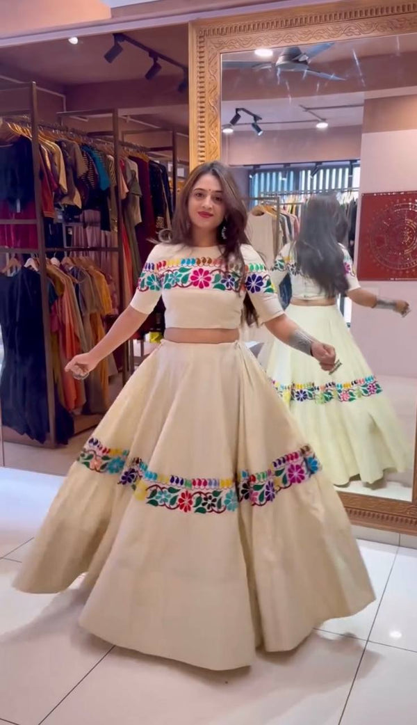 Off White Exquisite Pure Kora Cotton Navratri Lehenga Choli with Gamthi & Mirror Handwork ClothsVilla