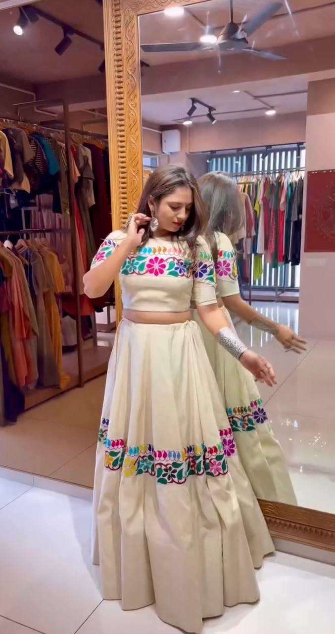 Off White Exquisite Pure Kora Cotton Navratri Lehenga Choli with Gamthi & Mirror Handwork ClothsVilla