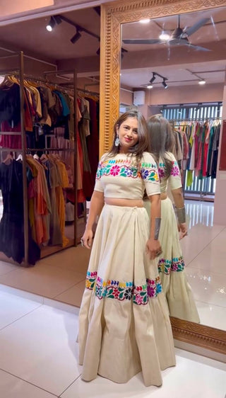 Off White Exquisite Pure Kora Cotton Navratri Lehenga Choli with Gamthi & Mirror Handwork ClothsVilla