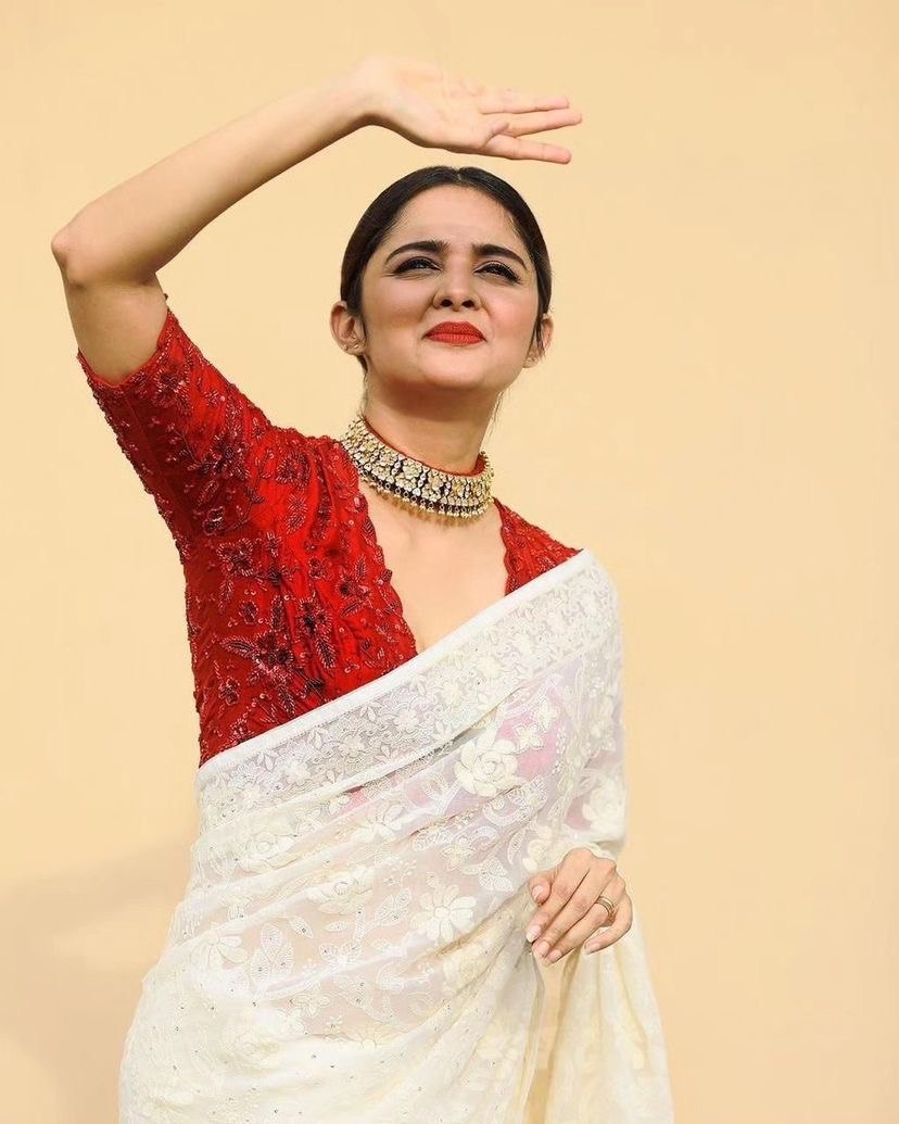 Off White Eye-Catching Bollywood Elegance: Rangoli Silk Saree with Sequined Blouse ClothsVilla