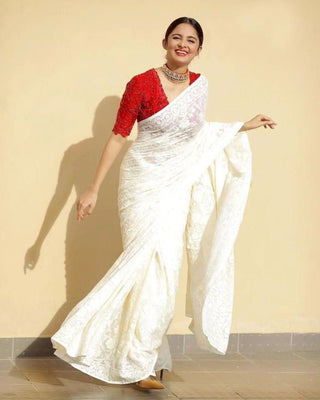 Off White Eye-Catching Bollywood Elegance: Rangoli Silk Saree with Sequined Blouse ClothsVilla