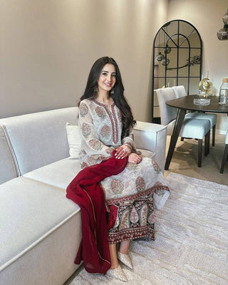 Off White Heavy Faux Georgette Embroidered Suit Set with Printed Crepe Plazzo & Lace Dupatta Clothsvilla