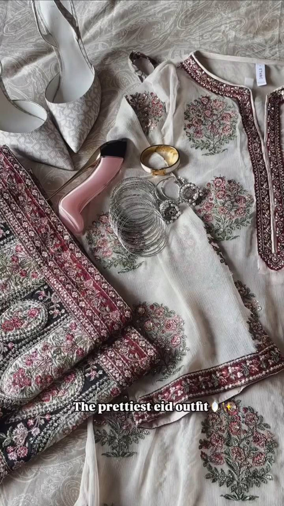 Off White Heavy Faux Georgette Embroidered Suit Set with Printed Crepe Plazzo & Lace Dupatta Clothsvilla