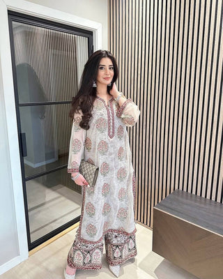 Off White Heavy Faux Georgette Embroidered Suit Set with Printed Crepe Plazzo & Lace Dupatta Clothsvilla