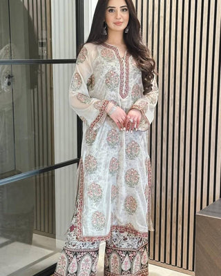 Off White Heavy Faux Georgette Embroidered Suit Set with Printed Crepe Plazzo & Lace Dupatta Clothsvilla