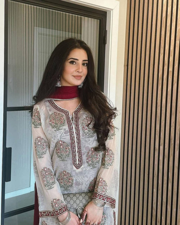 Off White Heavy Faux Georgette Embroidered Suit Set with Printed Crepe Plazzo & Lace Dupatta Clothsvilla