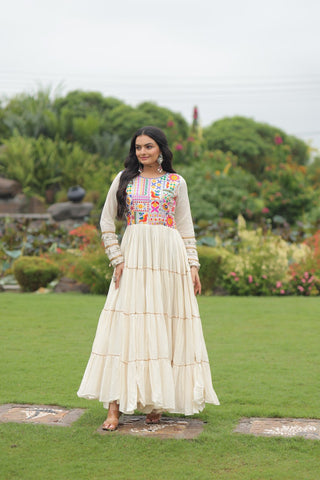 Off-White Navaratri Special Kora Cotton Embroidered Gown with Gota Patti Work & 12 Meter Flair ClothsVilla