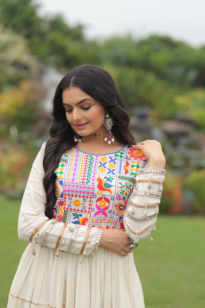 Off-White Navaratri Special Kora Cotton Embroidered Gown with Gota Patti Work & 12 Meter Flair ClothsVilla