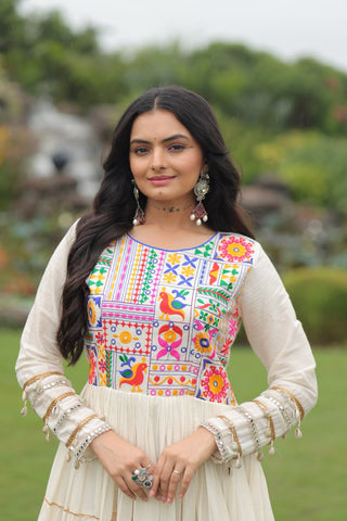 Off-White Navaratri Special Kora Cotton Embroidered Gown with Gota Patti Work & 12 Meter Flair ClothsVilla