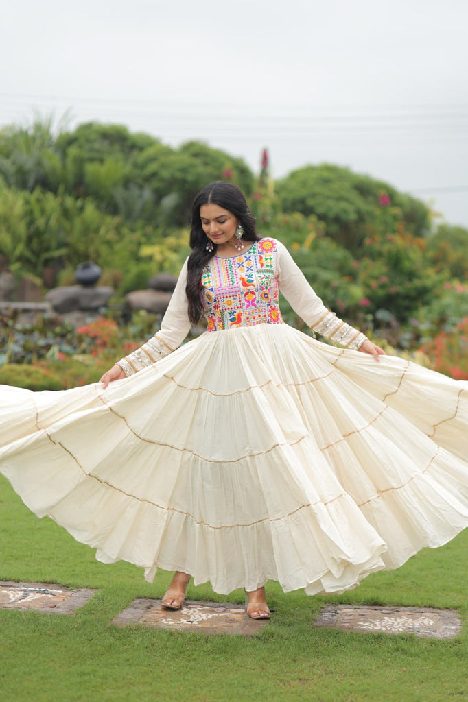 Off-White Navaratri Special Kora Cotton Embroidered Gown with Gota Patti Work & 12 Meter Flair ClothsVilla