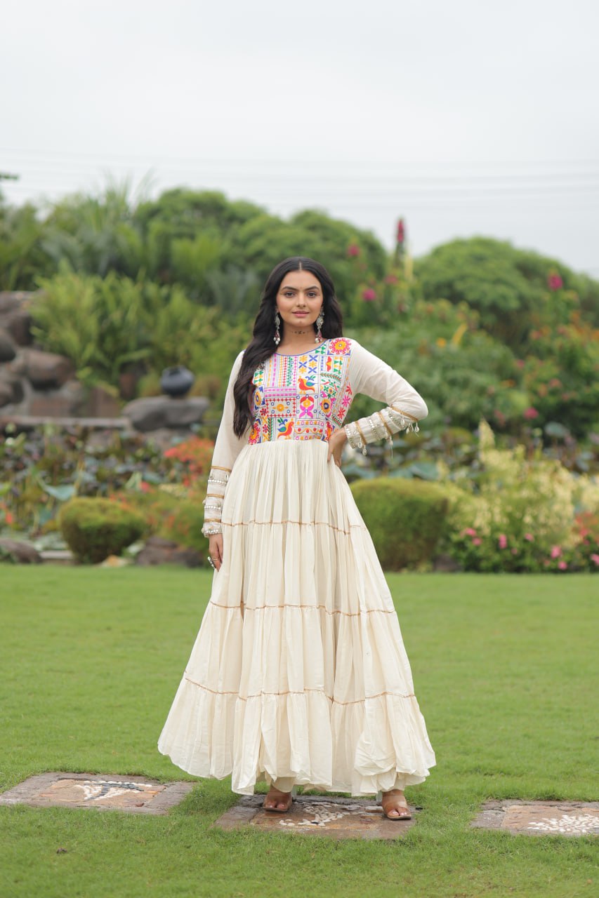 Off-White Navaratri Special Kora Cotton Embroidered Gown with Gota Patti Work & 12 Meter Flair ClothsVilla