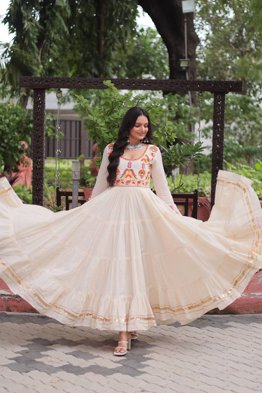 Off White Kora Cotton Embroidered Gown with Multi-Thread & Gota Patti Work – Full Sleeves, 12 Meter Flair, Fully Stitched ClothsVilla