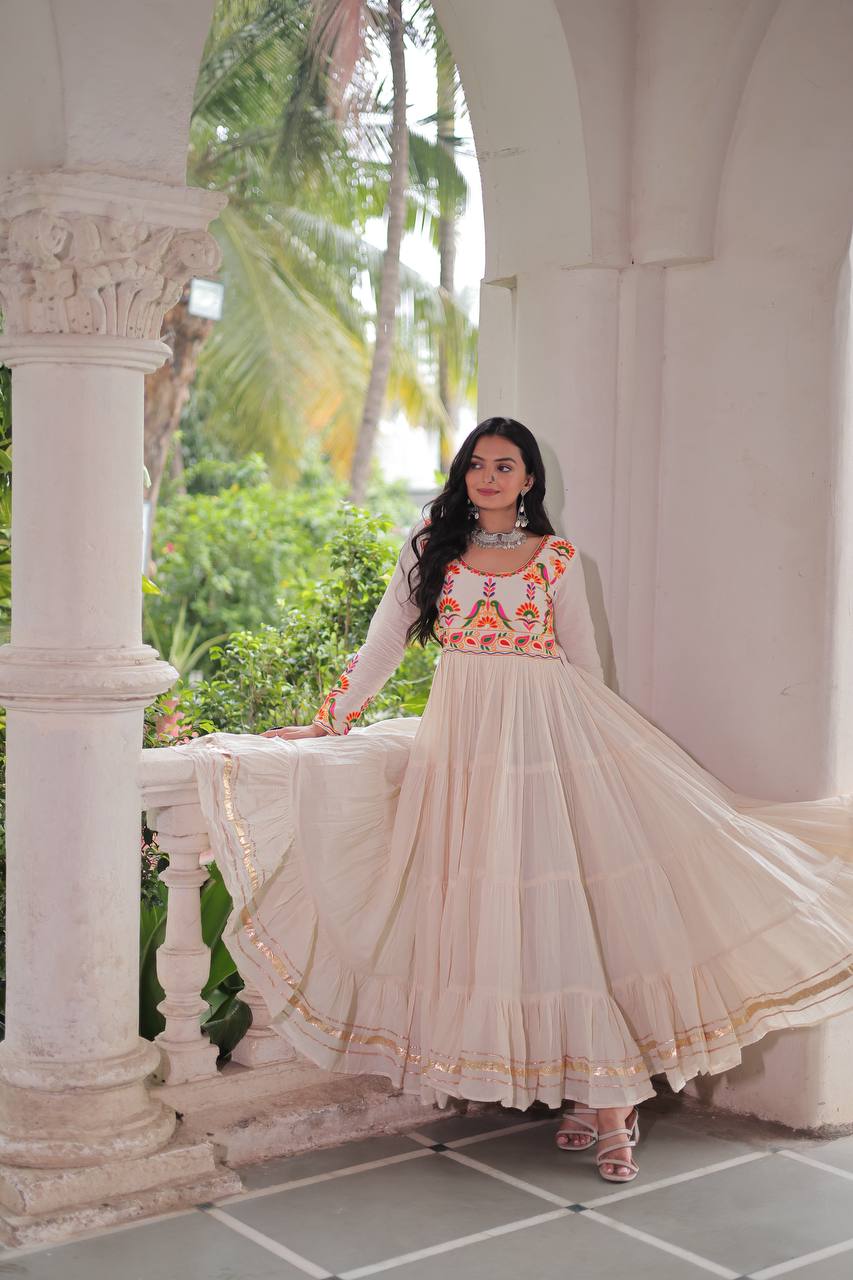 Off White Kora Cotton Embroidered Gown with Multi-Thread & Gota Patti Work – Full Sleeves, 12 Meter Flair, Fully Stitched ClothsVilla